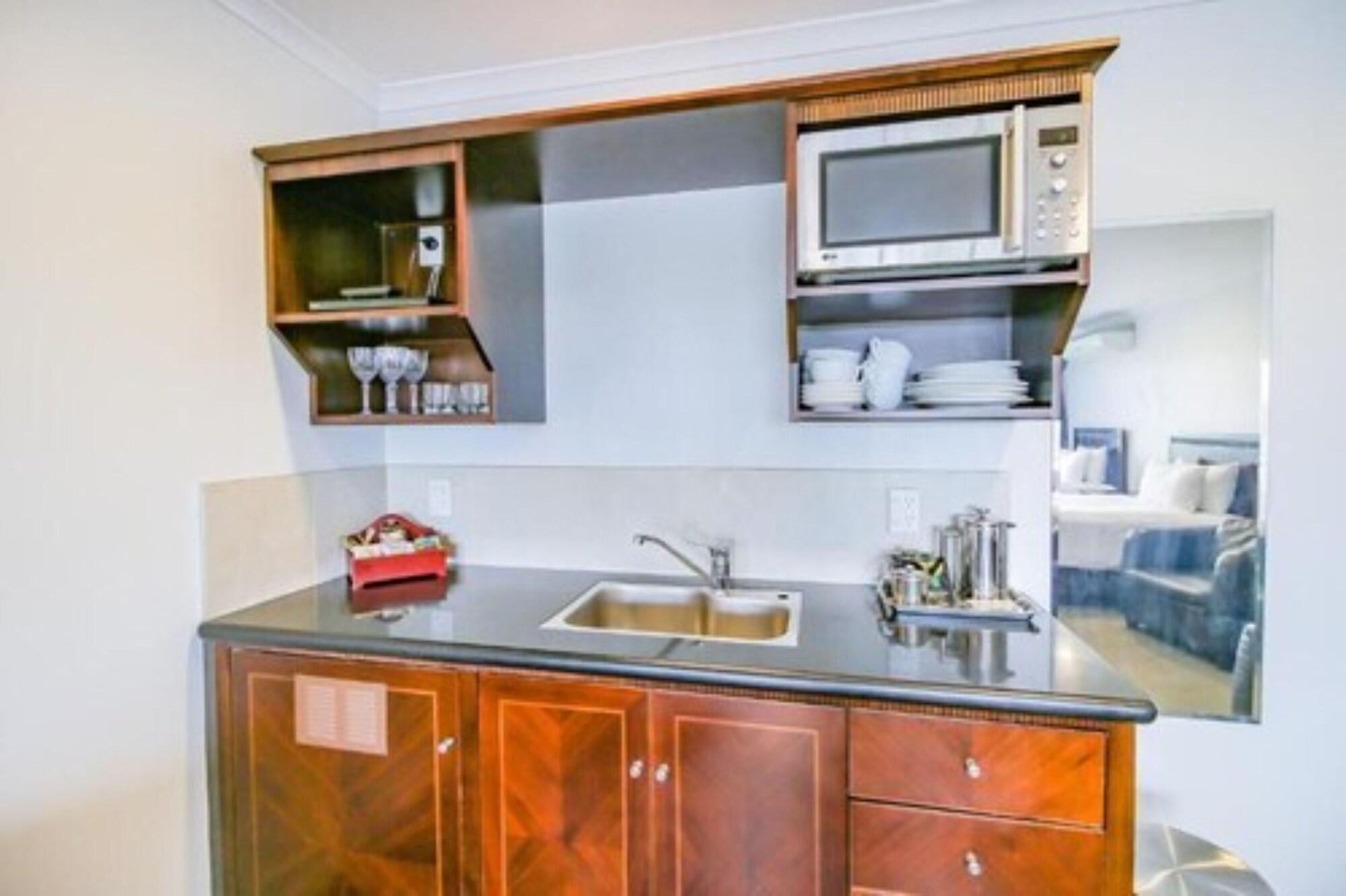 Aotea Motor Lodge วังกานุย ภายนอก รูปภาพ A kitchenette in a hotel room
